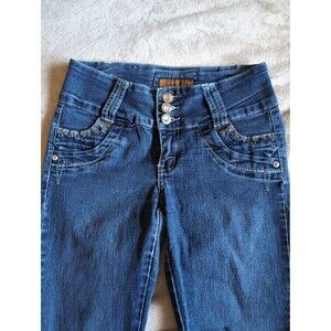 Classic blue skinny jeans size 7 with gem stones